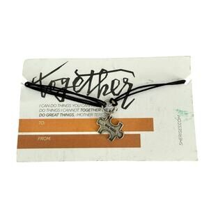 She Rises puzzle piece bracelet gift female empowerment